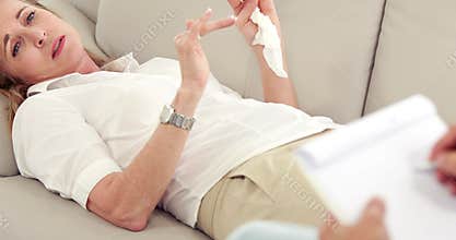 Depressed woman talking with her therapist