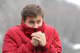 Man shivering in cold winter
