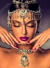 Beautiful Indian women portrait with jewelry.