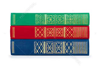 Stack of vintage red, green and blue books