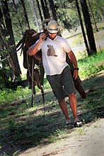Cowboy with Saddle