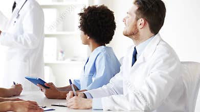 Group of doctors on seminar or lecture at hospital