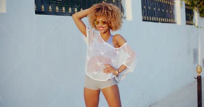 Happy Girl With Afro Haircut and Sunglasses