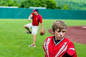 Youth baseball catcher up close