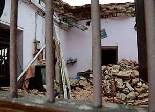DAMAGED HOUSE