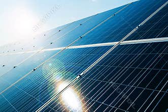 Sunray reflecting on solar power photovoltaic panel