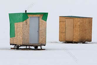 Two makeshift ice fishing cabins in Idaho