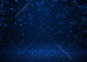 Blue sparkle glitter abstract background.
