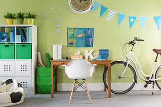 Stylish bike standing in room
