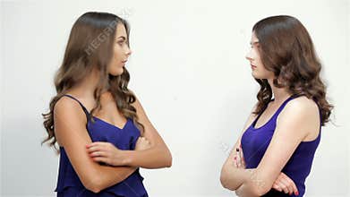 Angry sisters abusing of another scared one