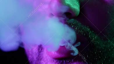 The mouth of man smoking the Hookah, . Slow motion