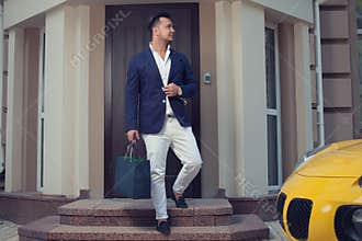 Man leaving a house