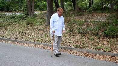 Disabled Man Using Cane