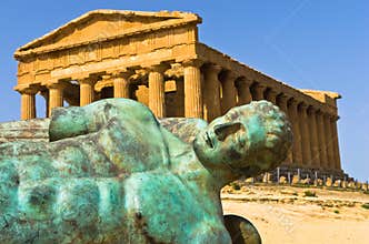 Icarus statue in front of Temple of Concordia at Agrigento Valley of the Temple, Sicily