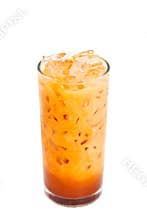 Glass of iced milk tea isolated on white background