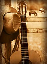 Cowboy hat and guitar.American music background