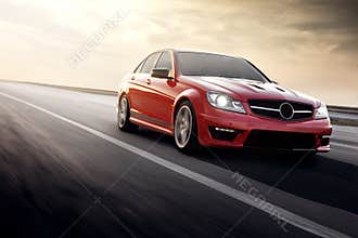 Fast drive red sport car speed on the road