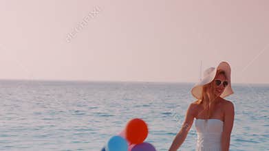 Pretty blonde woman having fun on beach