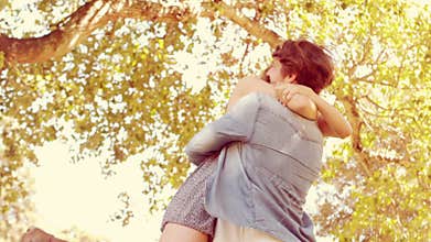 Cute couple hugging in the park