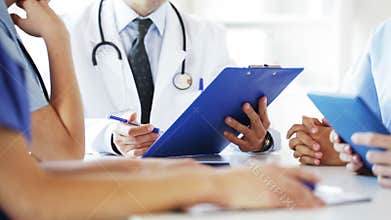 Group of doctors at meeting in hospital
