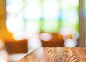 Empty wood table at blurred garden cafe background,Template mock