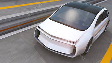 White electric car driving on highway