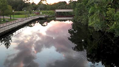 Slow pan on reflective still river