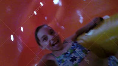 Happy little girl at aqua park