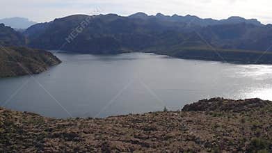 Aerial View - Flying by a Cliff and a Lake
