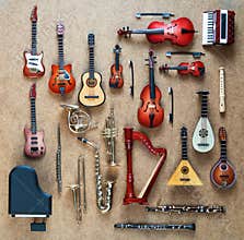 Set of different musical instruments. Golden brass wind and string musical orchestra instruments: saxophone, trumpet, french horn