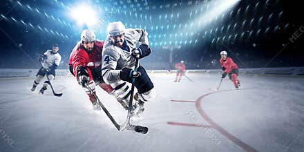 Hockey players shoots the puck and attacks