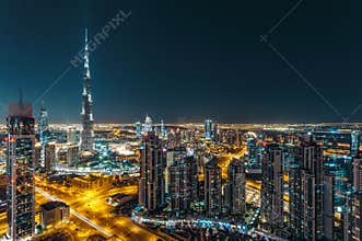 Fantastic rooftop view of Dubai's modern architecture by night