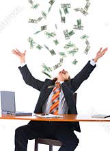 Young businessman and falling money