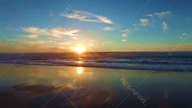 Surfing at Arifana in tbe atlantic ocean in Portugal