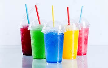 Colorful Frozen Fruit Slush Drinks in Plastic Cups