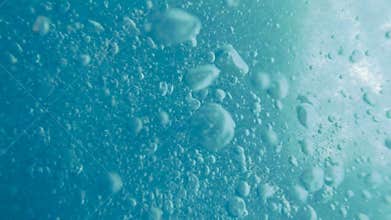 Bubbles under water. Water in the pool.