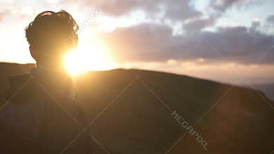 Man Staring into the Sunset