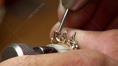 Manual setting of the precious stones in jewelry