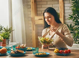 Woman prepares the family dinner