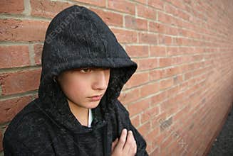 Boy in hooded top