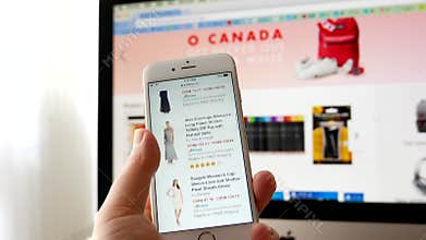 Man browsing amazon website for buying skirt