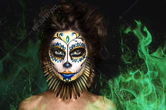 Portrait, halloween girl , dead mexican goddess Los Muertos in fire