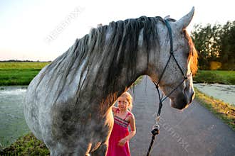 Horse and a little girl