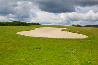 Sand golf bunker on a empty golf course