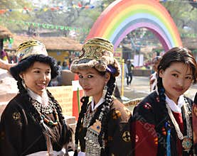 Pretty girls in traditional Indian Tribal dresses and enjoying the fair