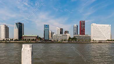 Time lapse in Rotterdam with Nieuwe Maas and ships.