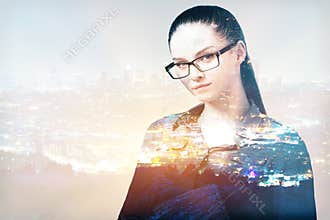 Businesswoman on abstract city background