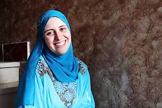 Happy arab muslim woman wearing hijab