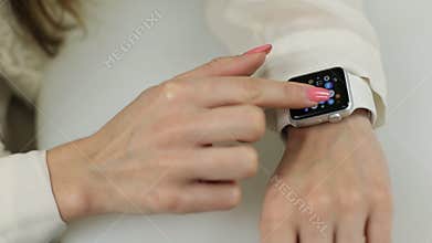 BANGKOK, THAILAND -MAY 7, 2015: close up image of the new apple watch sport on woman wrist on MAY 7, 2015 in Bangkok
