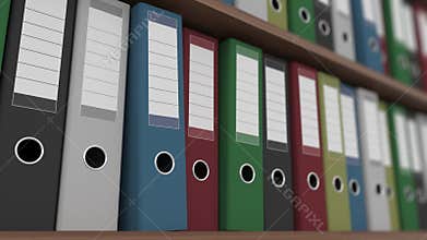 Rows of multicolored binders on shelves dolly close up shot. 4K seamless loopable clip